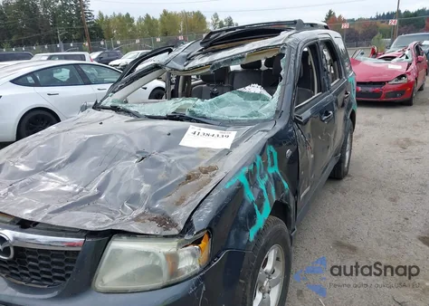 2008 Mazda Tribute Hybrid Grand Touring from USA, damaged, VIN 4F2CZ59H98KM01488
